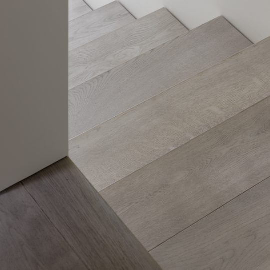 Beautiful staircase made from tactile grey Otto flooring in XI Pewter